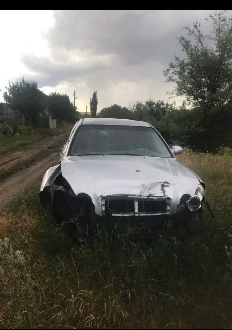 Реальный выкупленный автомобиль: серебристый автомобиль с повреждением передней части